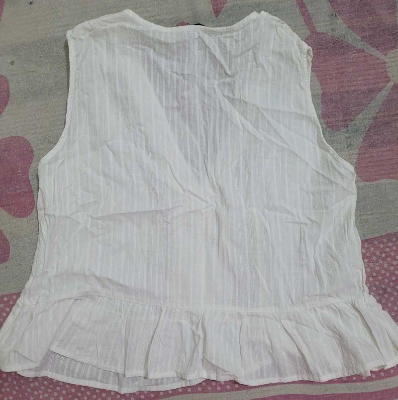 White Sleeveless Top