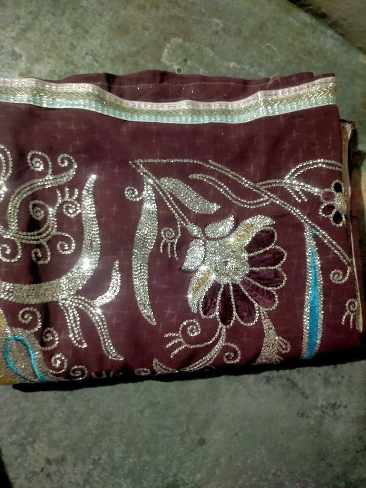 Elegant Brown Embellished Saree