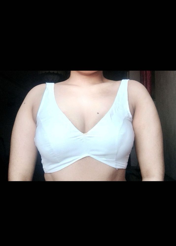 white sleeveless blouse