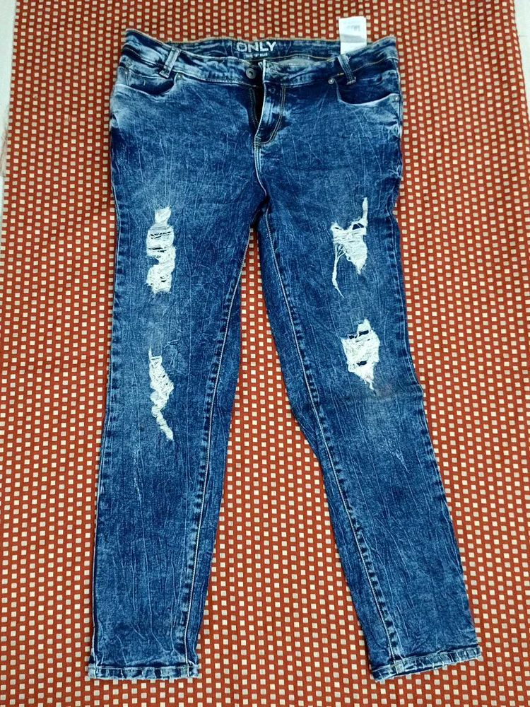 Distressed Denim Jeans