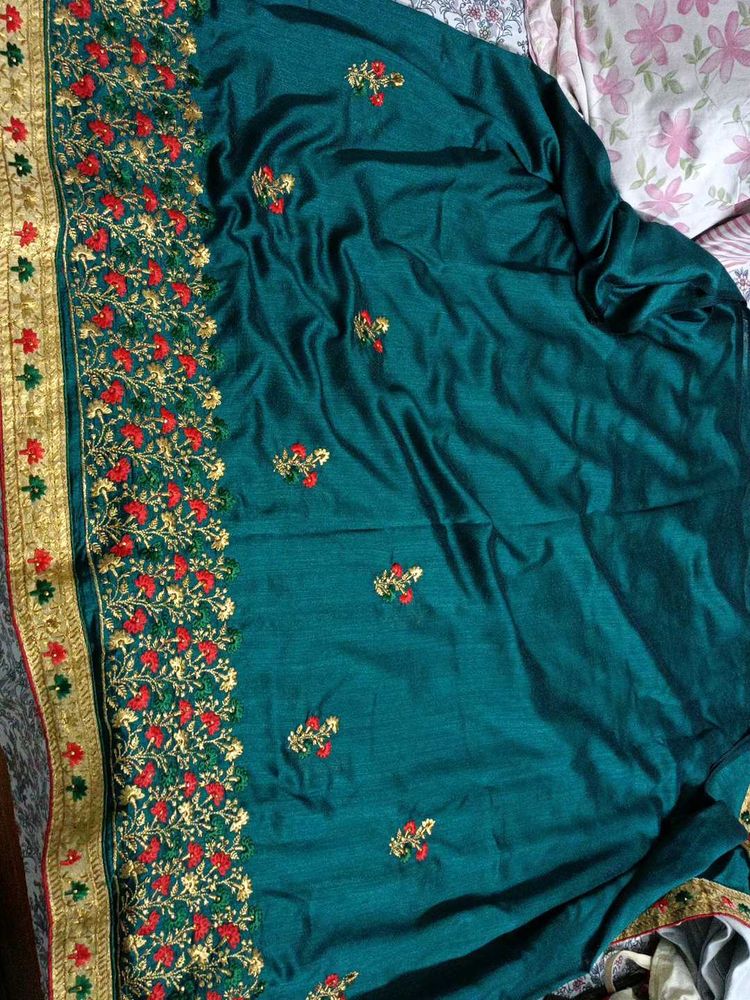 Elegant Teal Embroidered Saree