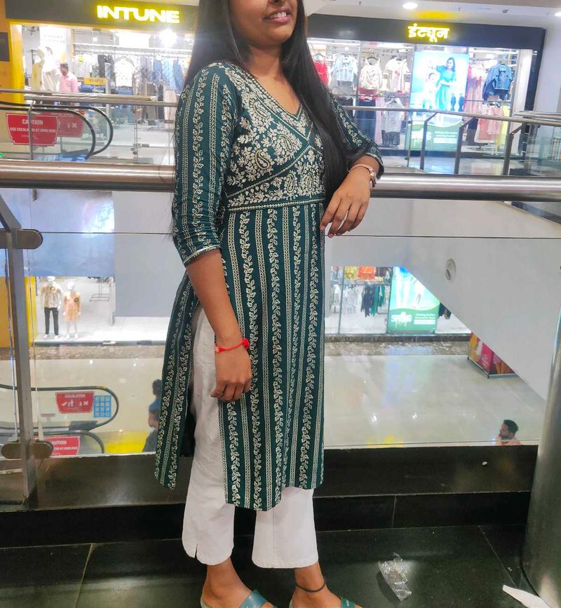 A Beautiful Green Colour Straight Kurti