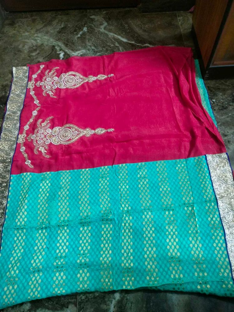 Red &amp;firoja colour saree.