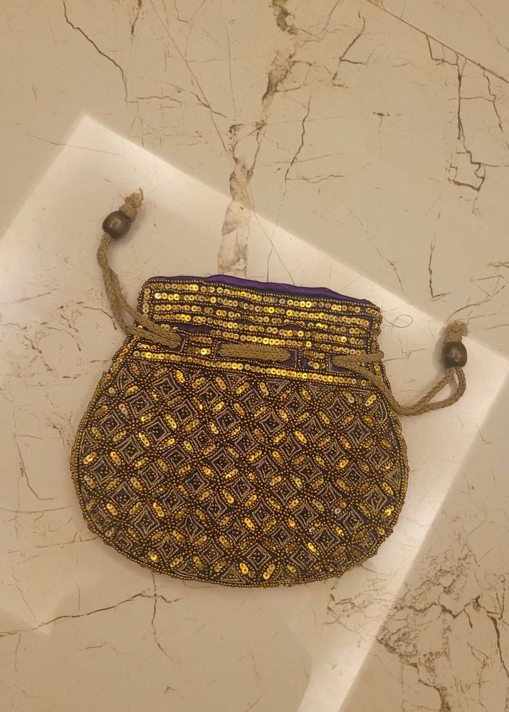Exotic India Embroidered Satin Potli