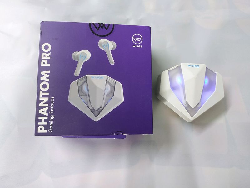 Wings Phantom Pro Ear Buds 2 Months Old. With Bill Box And Charger.