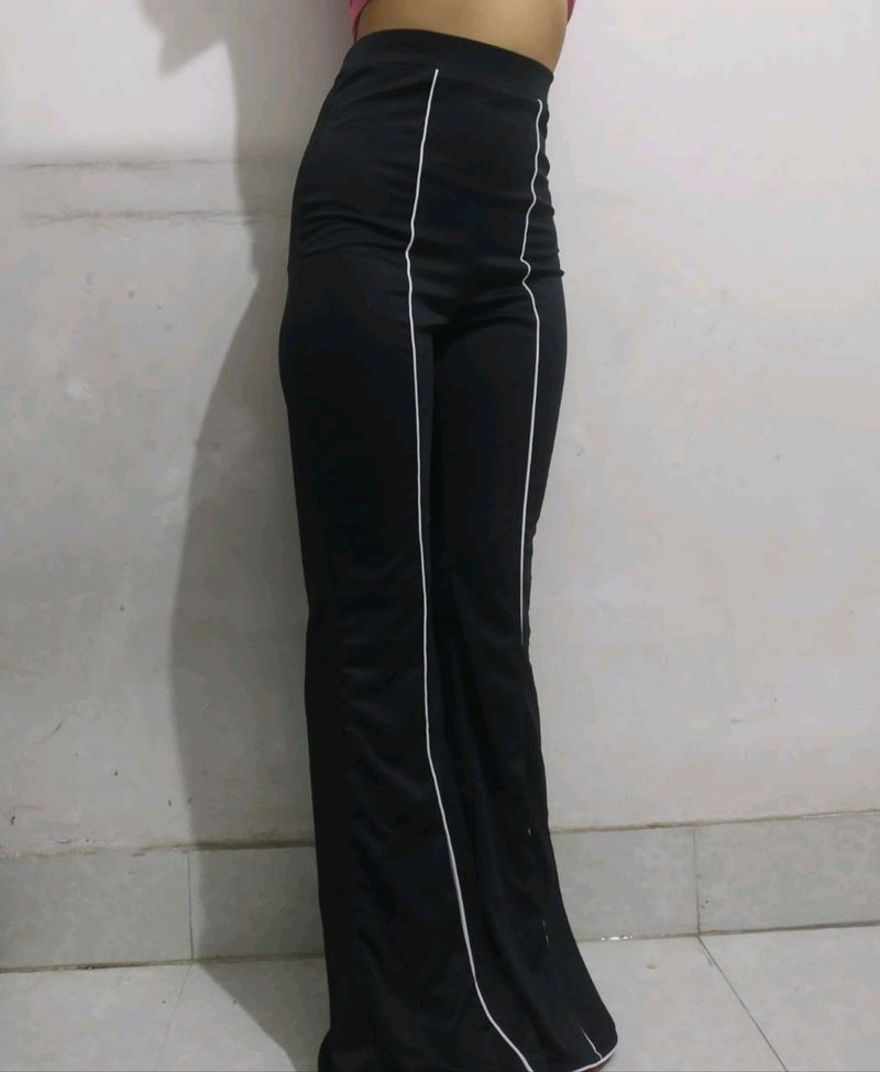 Combo of SSS black bootcut trousers and H&amp;M peach top