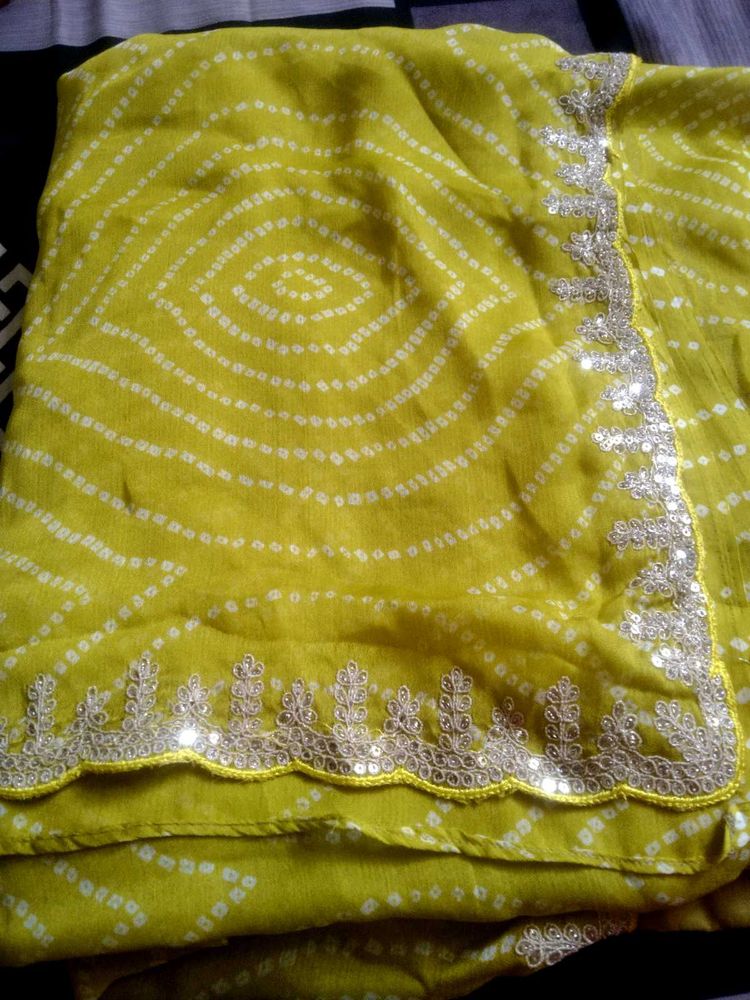 Yellow Bandhani Saree with Silver Border