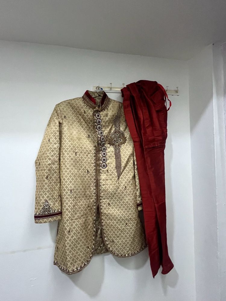 gold and maroon sherwani with shoes