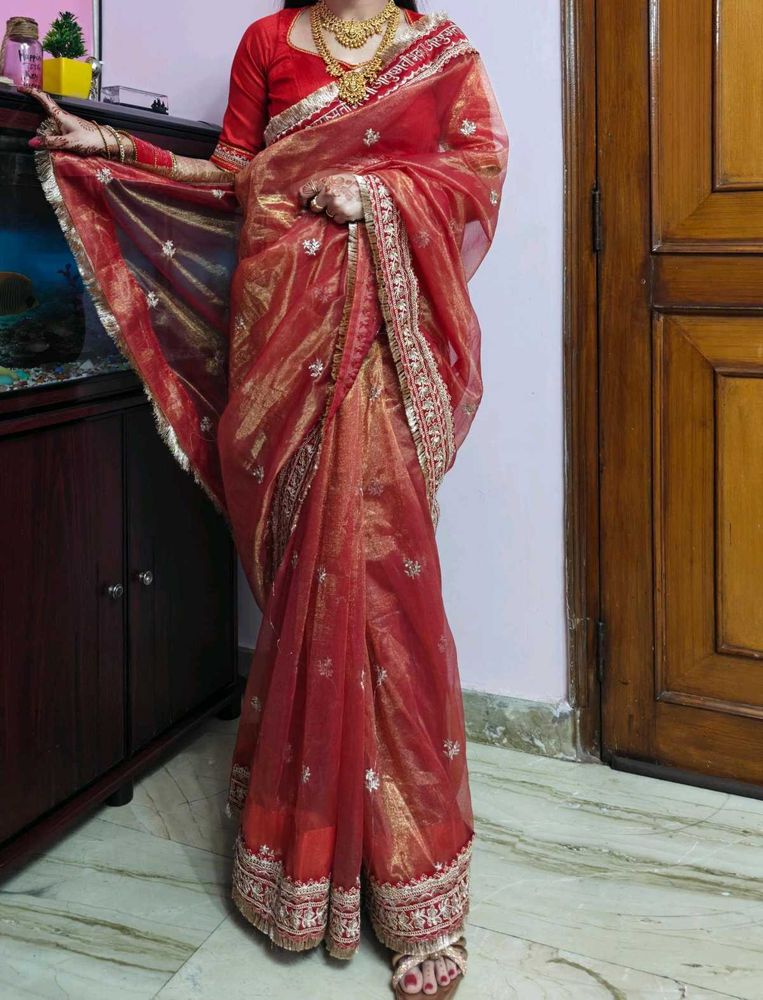 red saree with backless blouse