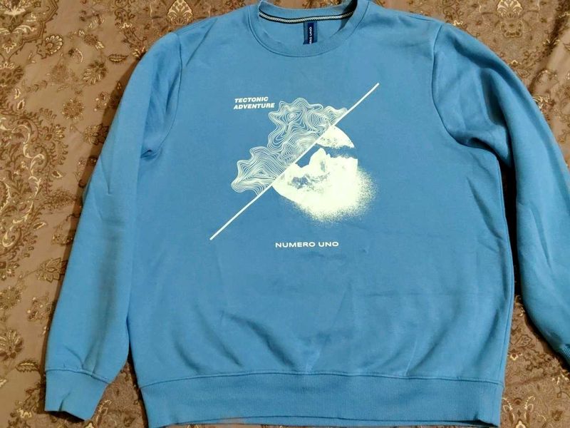 Blue Graphic Print Sweatshirt.