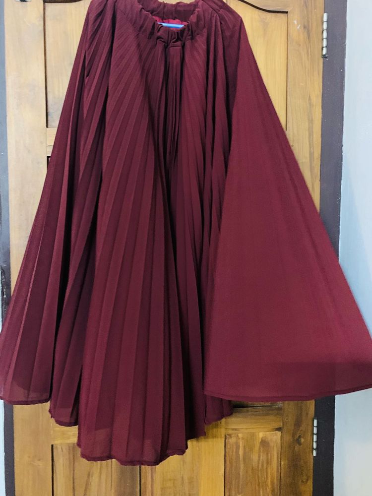 Pleated Maroon full skirt.