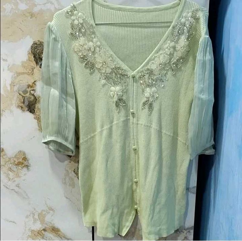 mint green knit top with embroidery