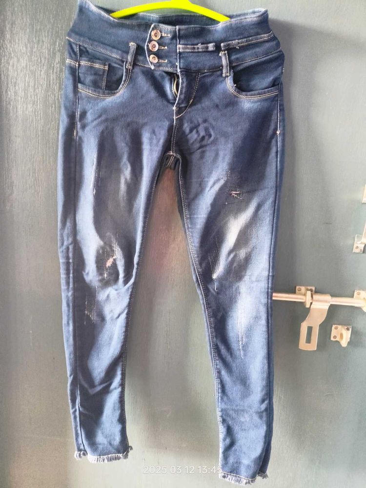 Distressed Denim Jeans