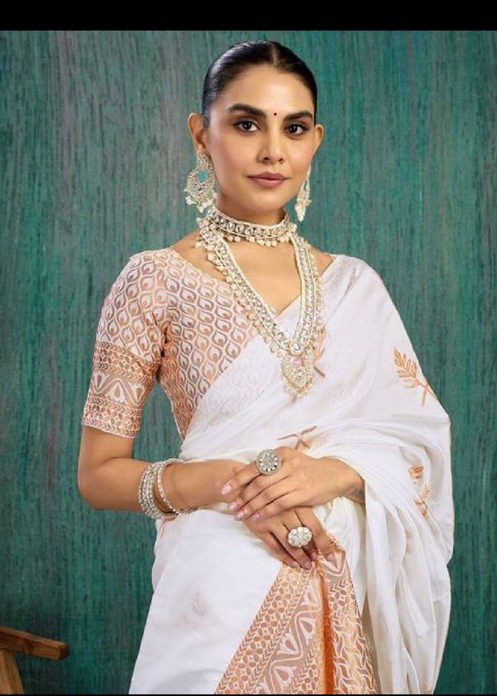 Elegant Silk white and gold saree
