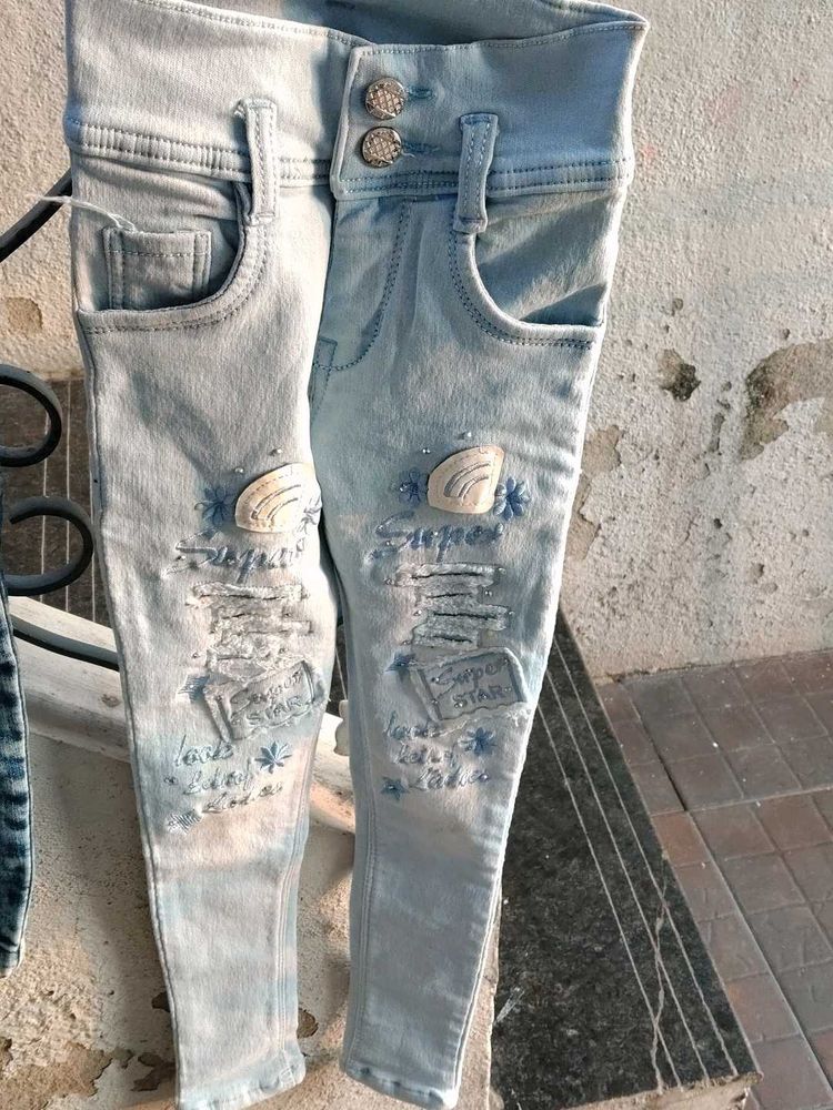 Distressed Denim Jeans