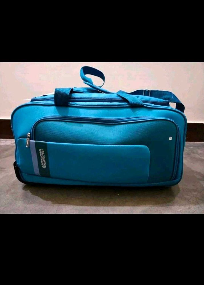 American tourister duffel bag with wheels