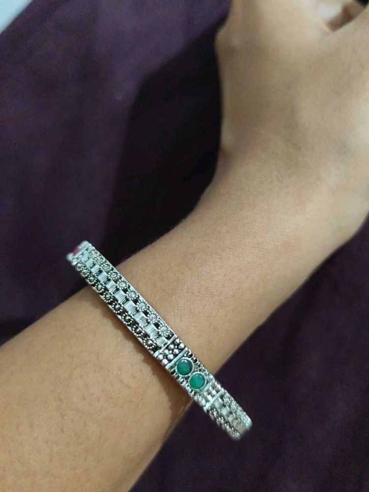 Stylish Silver Bangle with Stone Accents