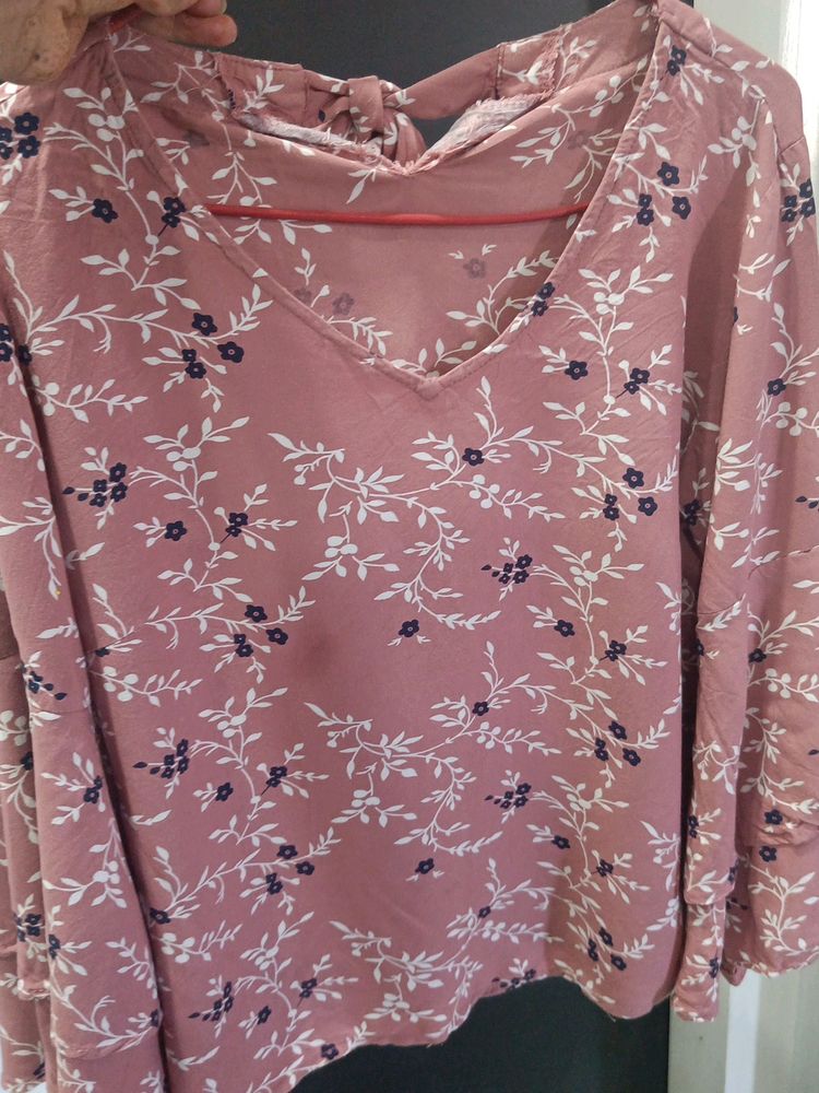 Beautiful Peach Colour Top With Flared Sleeves.