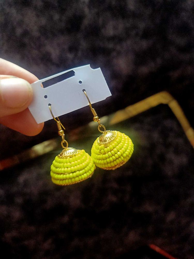 Yellow beaded jhumka earrings