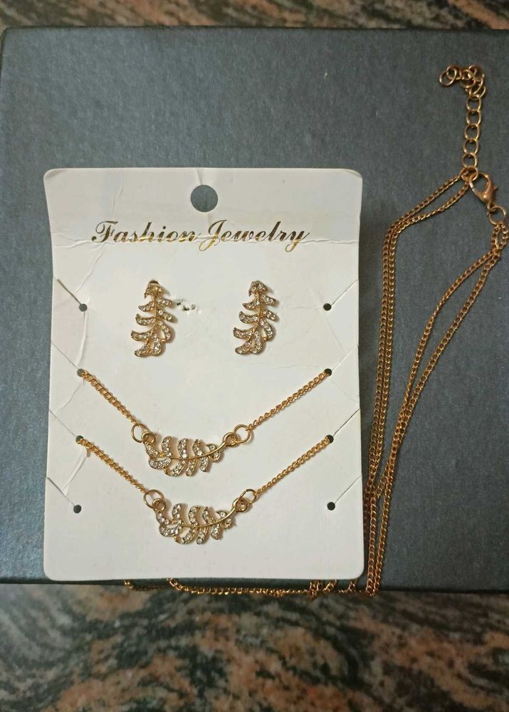Double Layered Neckpiece Set With Earrings.
