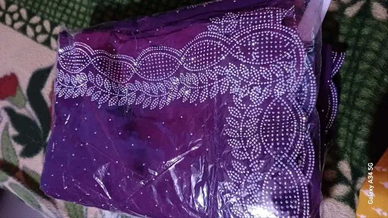 Georgette fabric saree with hevay daimond work Nam