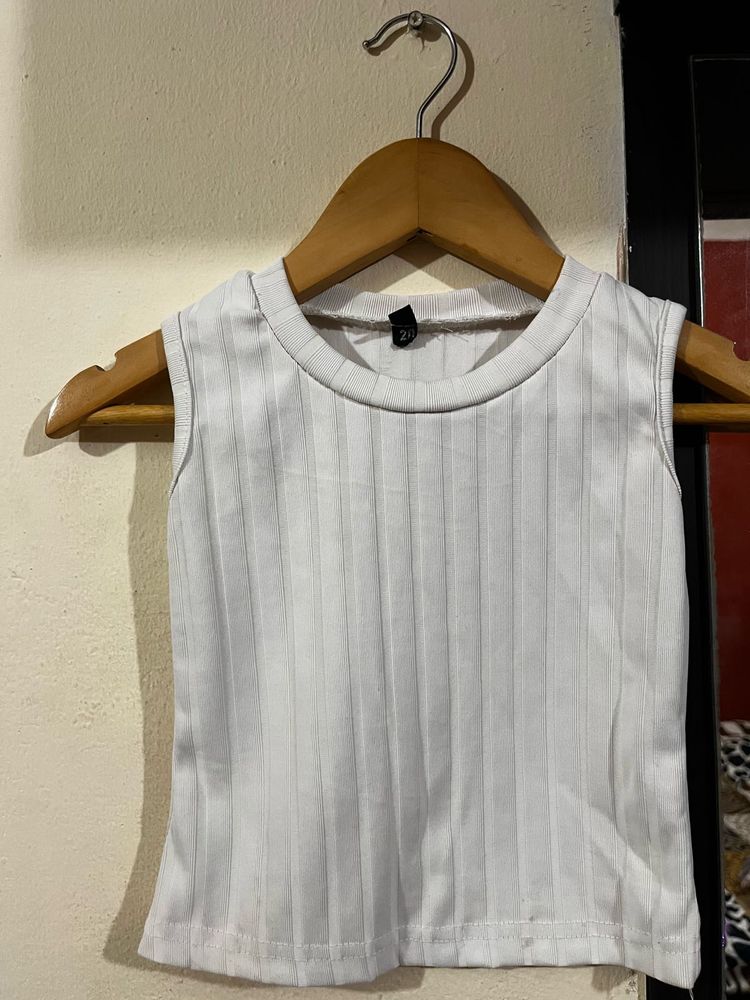 denim skir, white ribbed t shirt and  jac