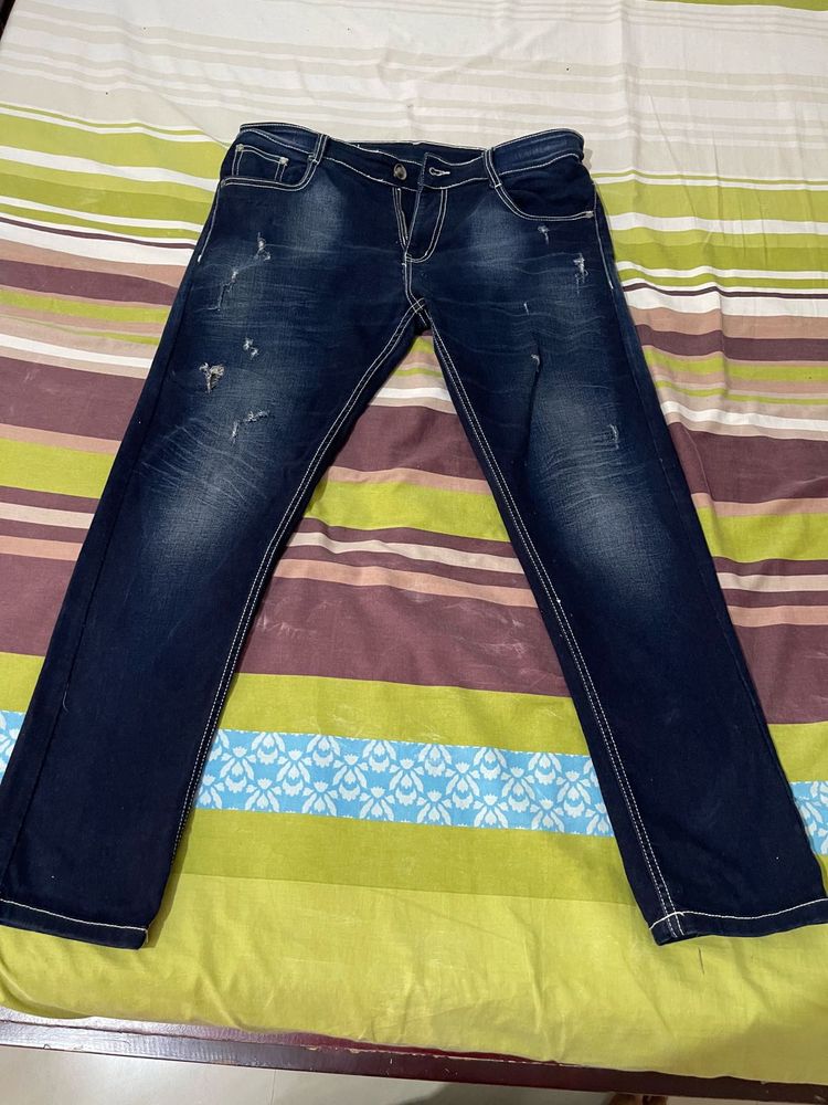 Distressed Denim Jeans