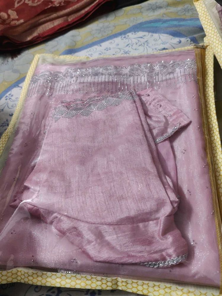 Elegant Light Pink Saree with Silver Detailing