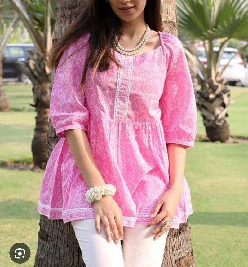 A Beautiful Baby Pink Nyra Pattern Kurti