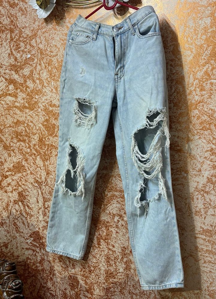 Distressed Light Wash Denim Jeans