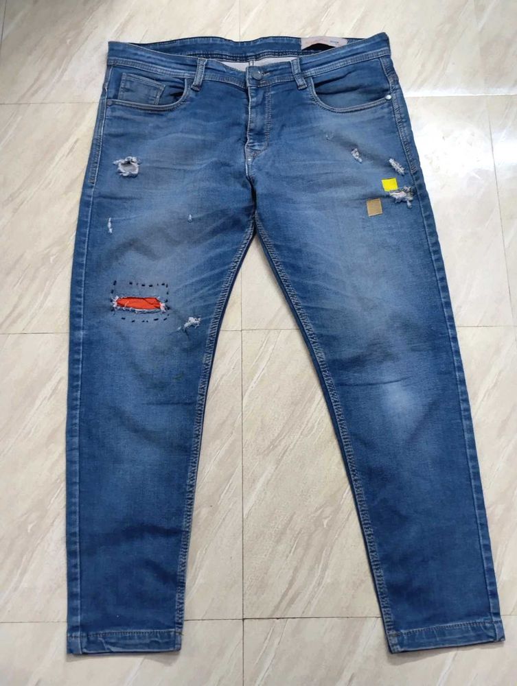 Distressed Denim Jeans with Patches