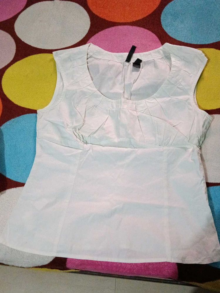 White Sleeveless Top