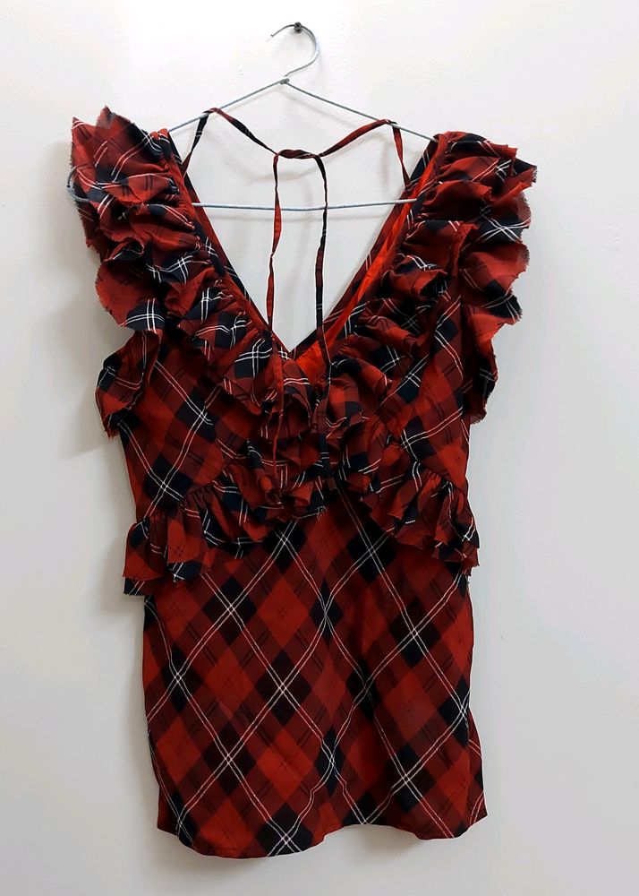 Sleeveless Ruffle Top With String In The Back