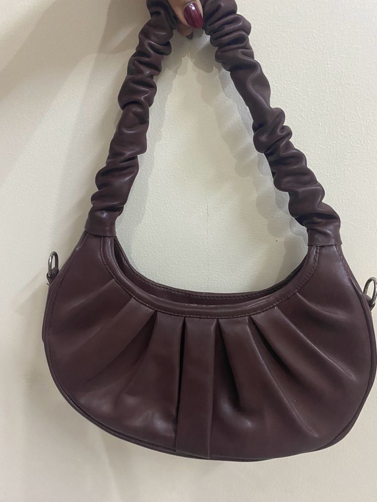 a beautiful chocolate-ish coffee brown sling bag