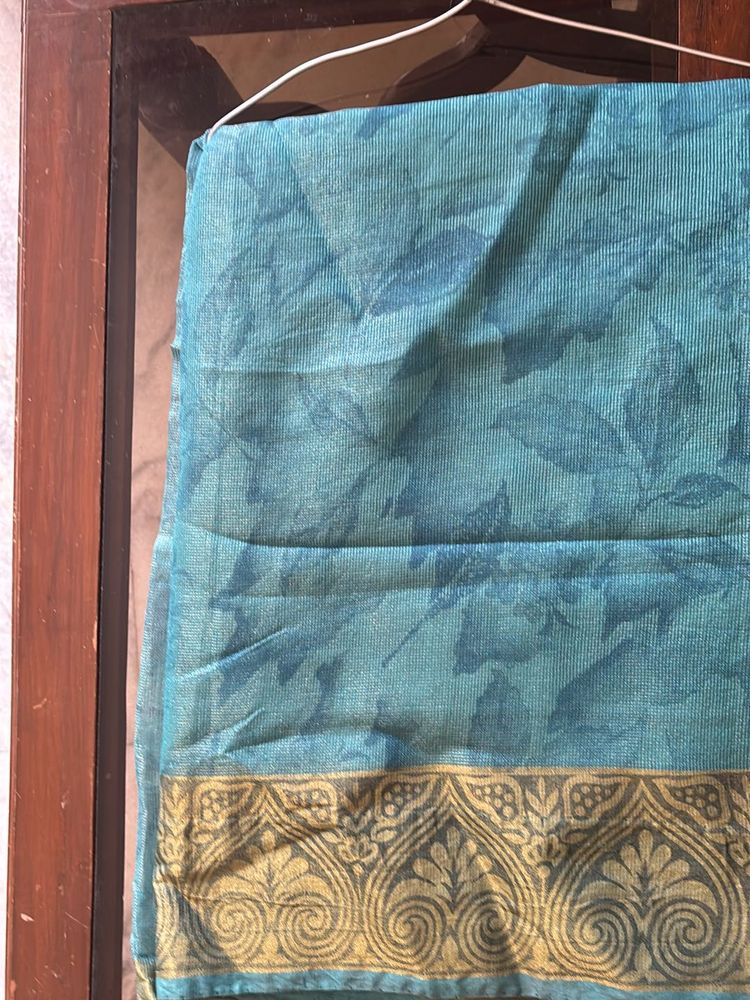 Blue Net Saree With Cream Border