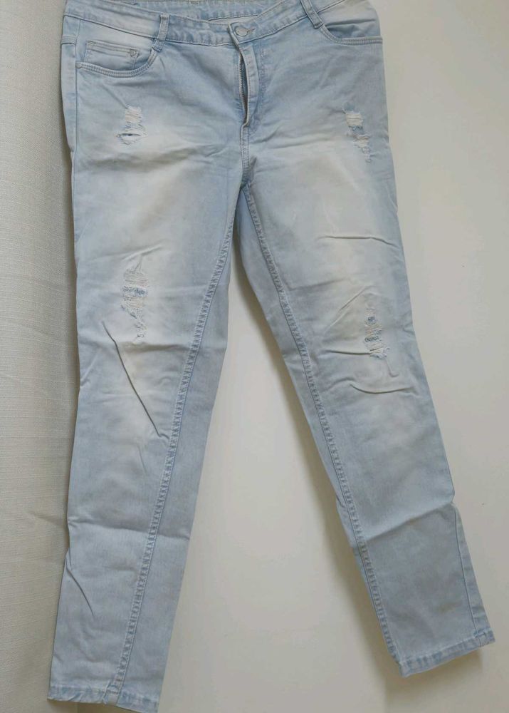 Ice Blue Colour Ripped Jeans