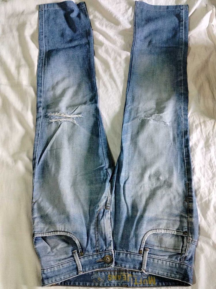 Ripped Light Wash Jeans