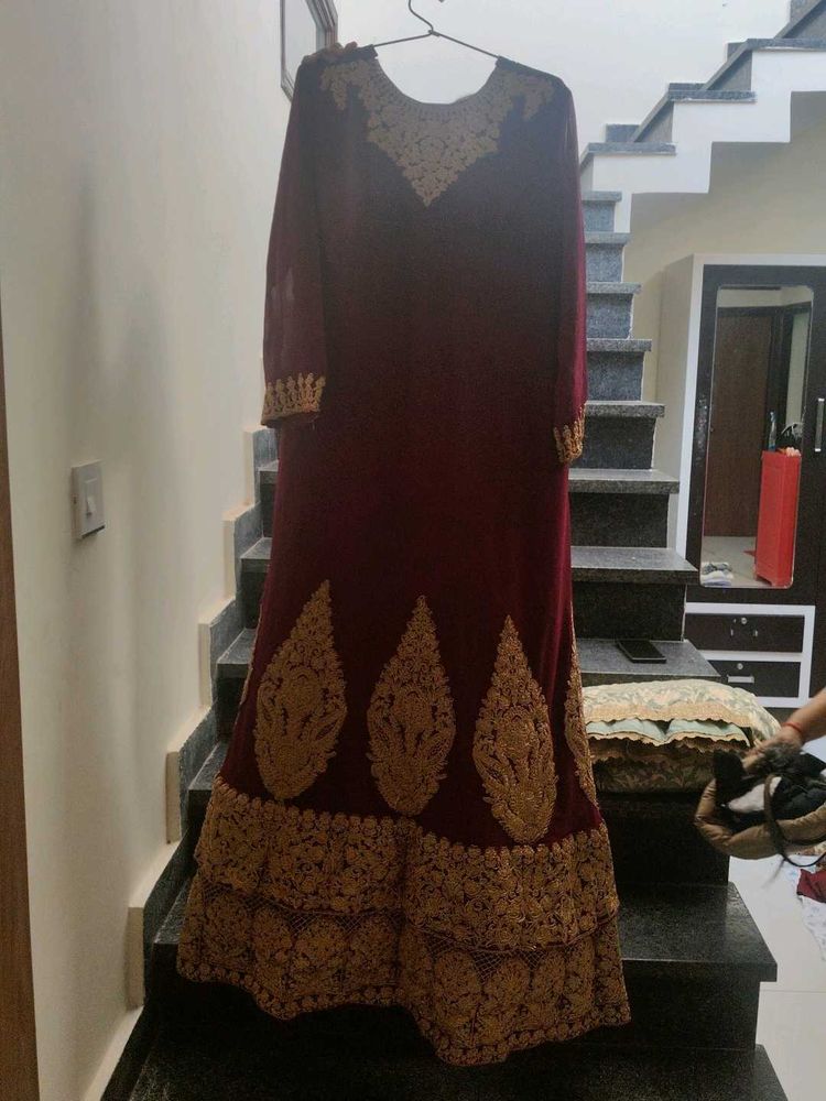 Elegant Maroon Embroidered Saree