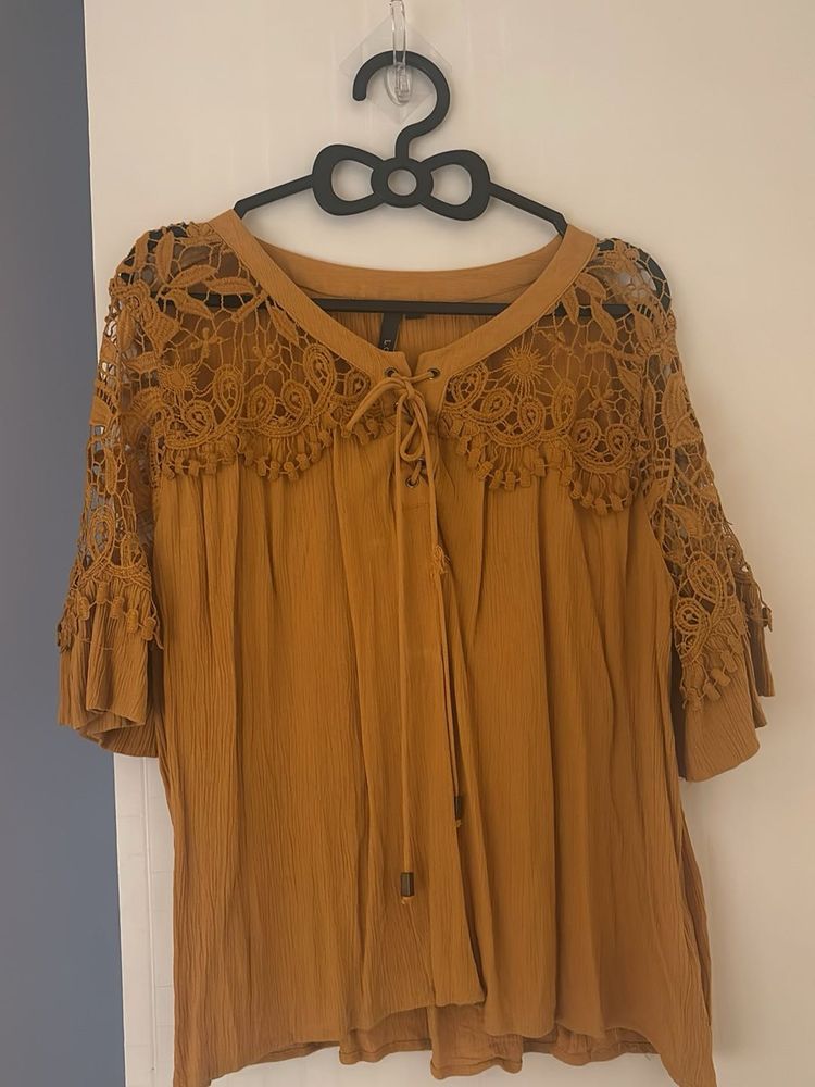 Mustard Top With Netted Hand Design Looks Classy