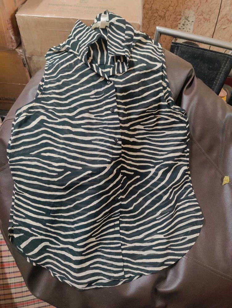 H.M Top