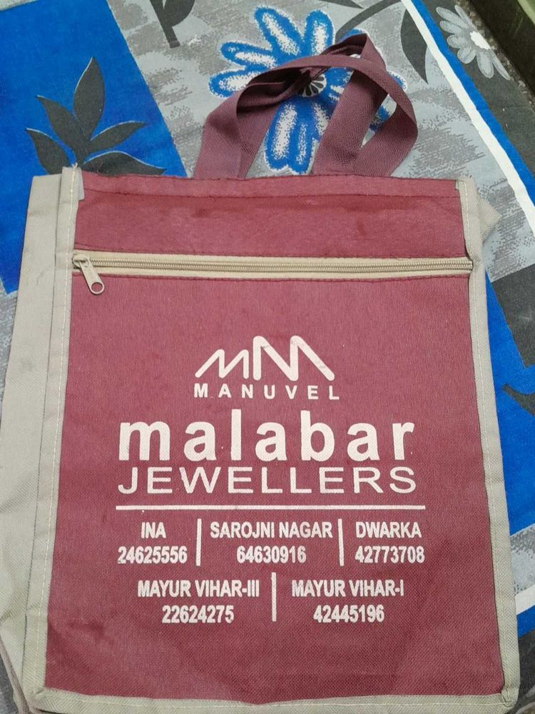 Original MALABAR JEWELLERS CARRY BAG WITH 2 Compar