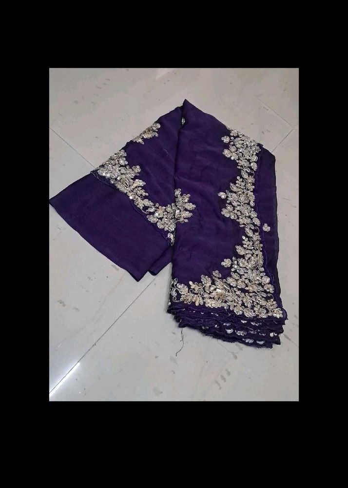 Elegant Purple Saree with Silver Embellishments