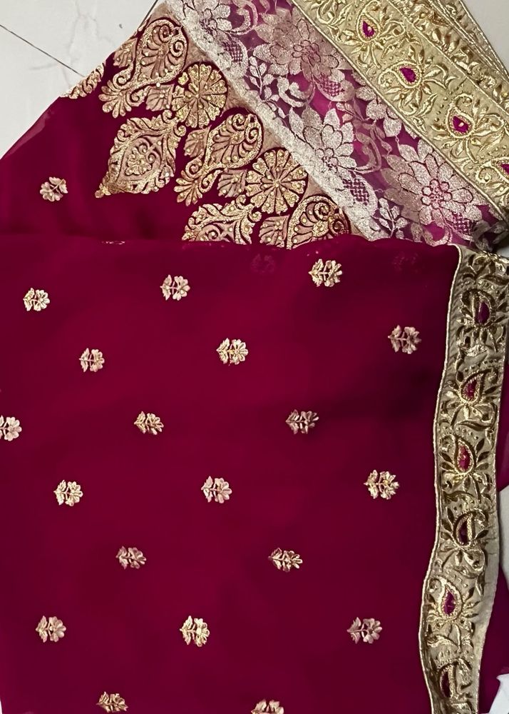 Elegant Maroon Embroidered Saree