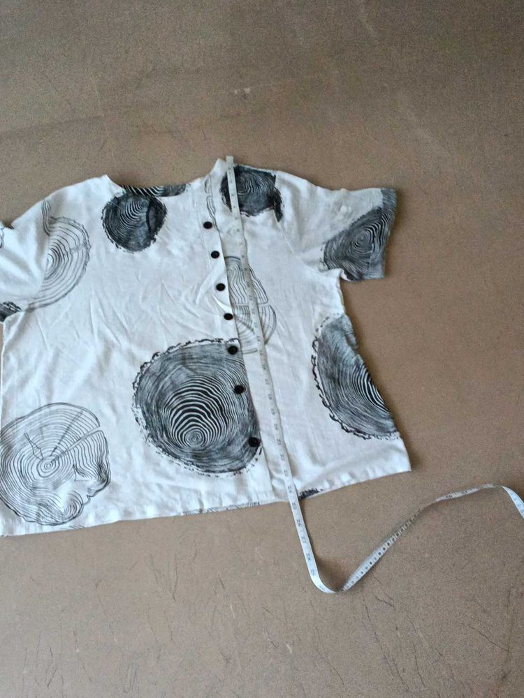 White Breezy top But one Sleeves Has flaws