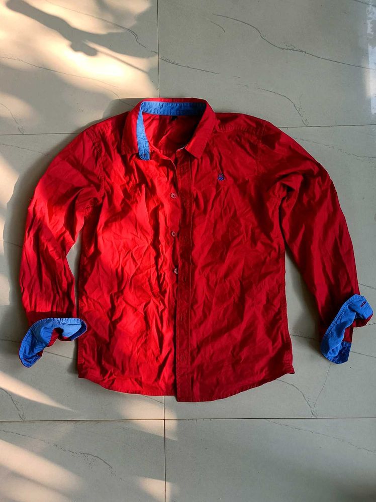Red Shirt with Blue Accents
