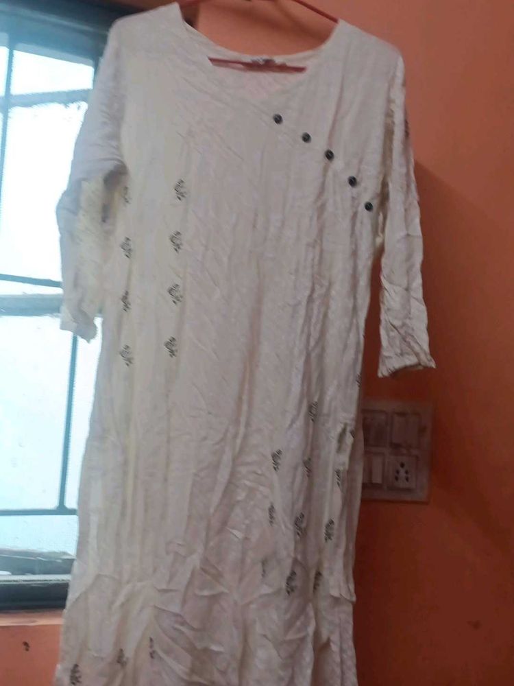 One Time Used Cream Embroidered Kurti