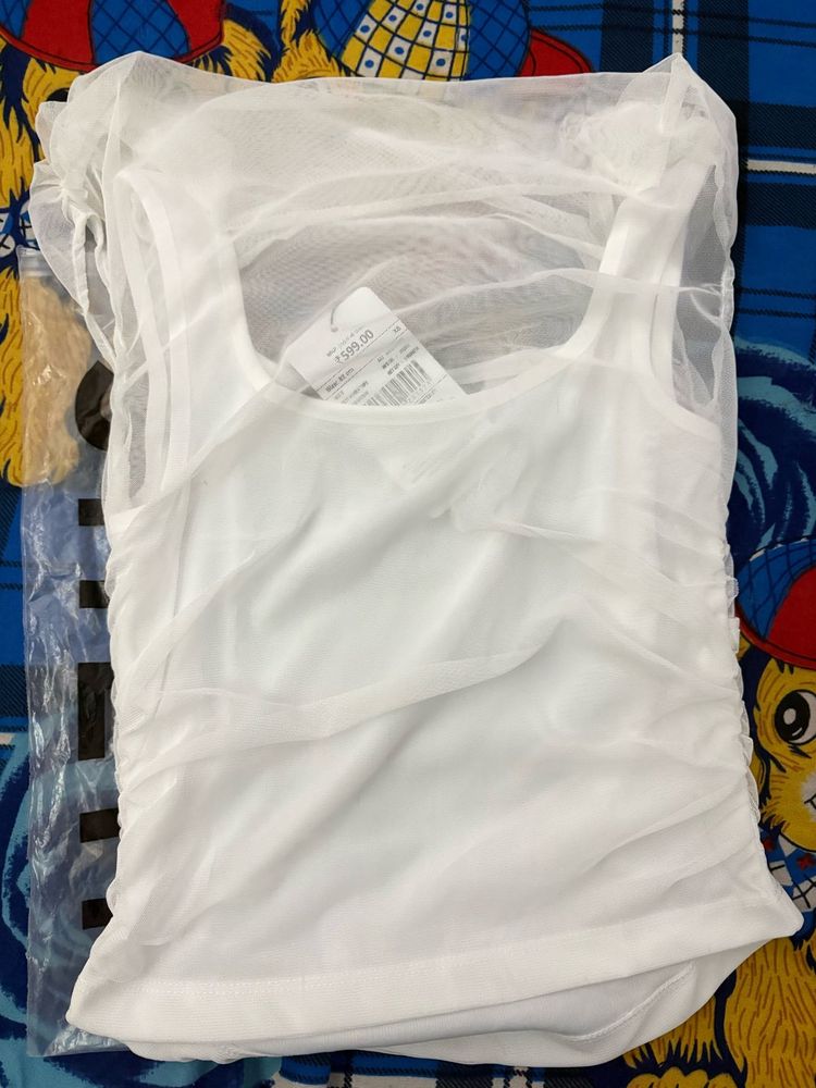 White Sleeveless Top