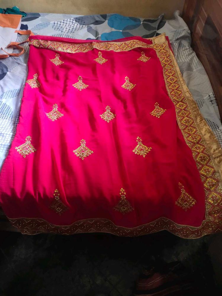 Rani Pink Chiffon Saree With Heavy Golden Border |