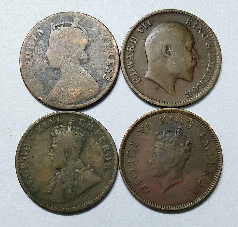One Quarter Anna 4 coins from different monarchs