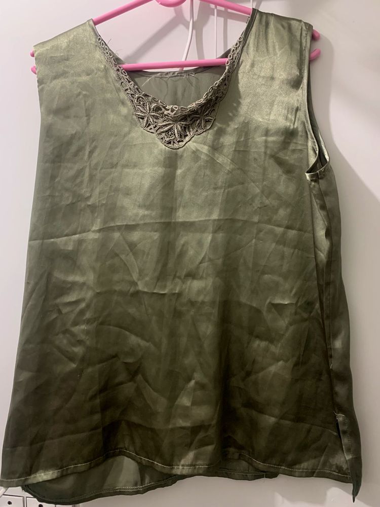 Green Sleeveless Top at Just ₹99